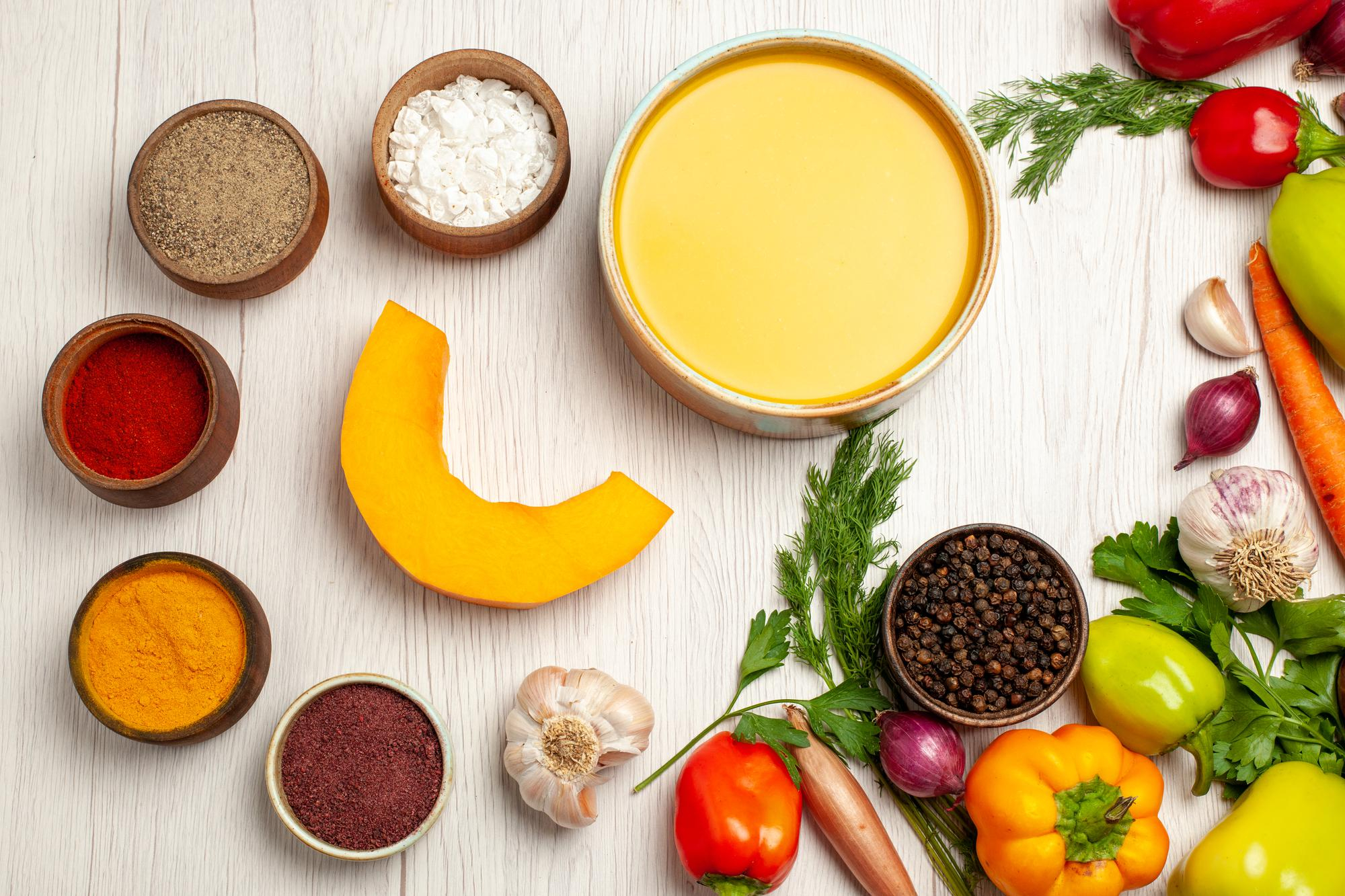 Mindful Flavour worktop with grains, herbs and seasonal vegetables